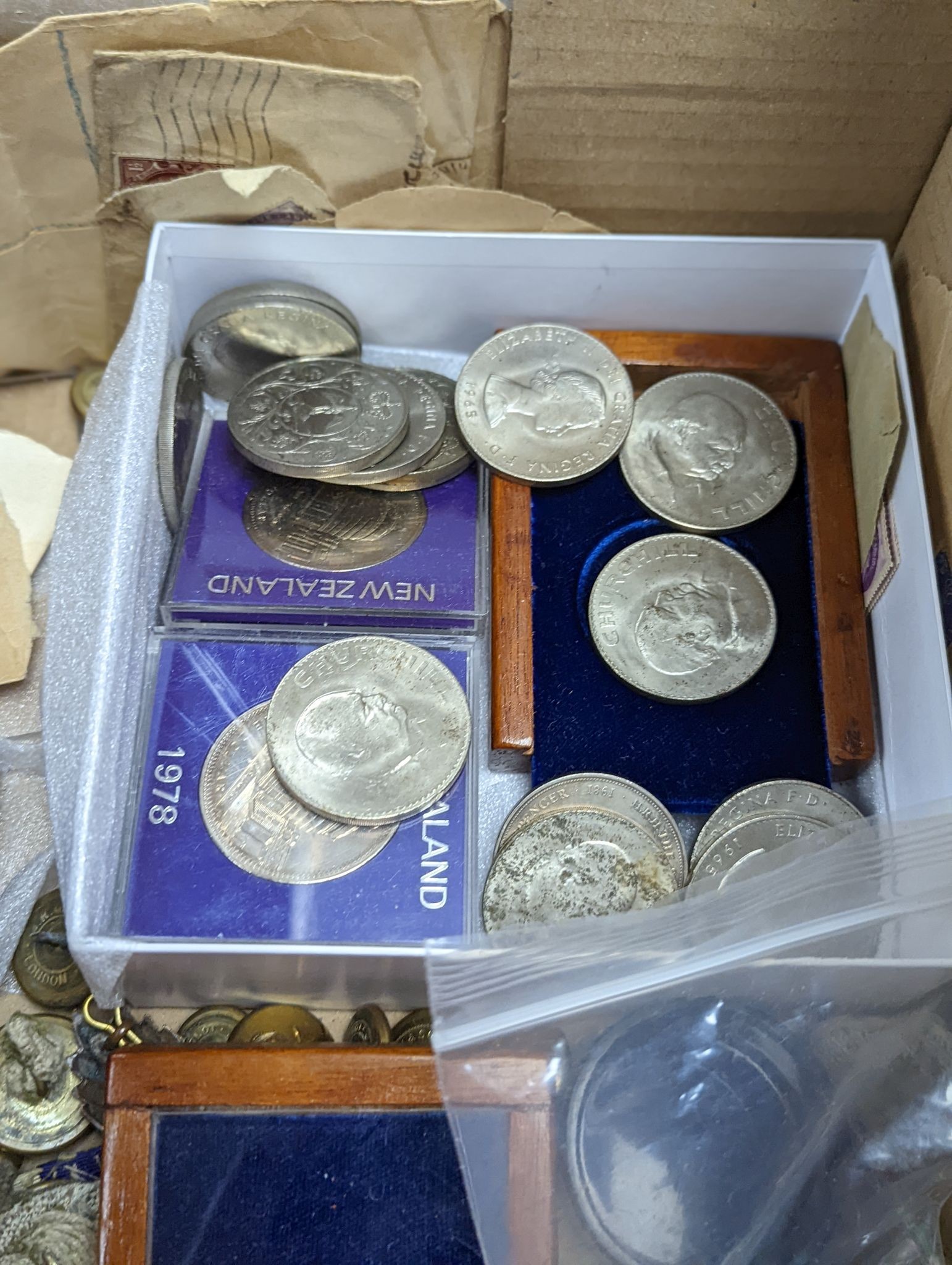 A collection of coins, commemorative Crowns, regimental buttons, etc.